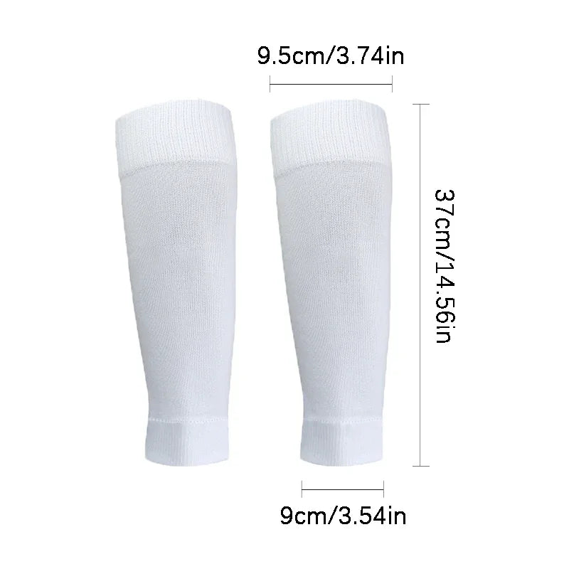 White football training socks and shin guards set displayed vertically with dimensions.