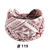 A close-up of a burgundy and white boho print cotton fabric used for hair headbands.