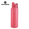 A pink insulated stainless steel thermal water bottle with a hinged lid.