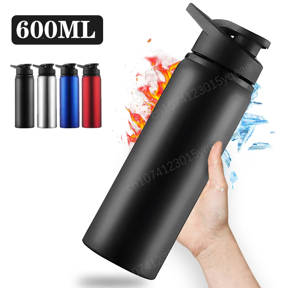 A black leakproof portable aluminum water bottle with multiple colored caps is held by a hand.