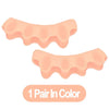 A pair of pink silicone toe separator and foot straightener shown from above.