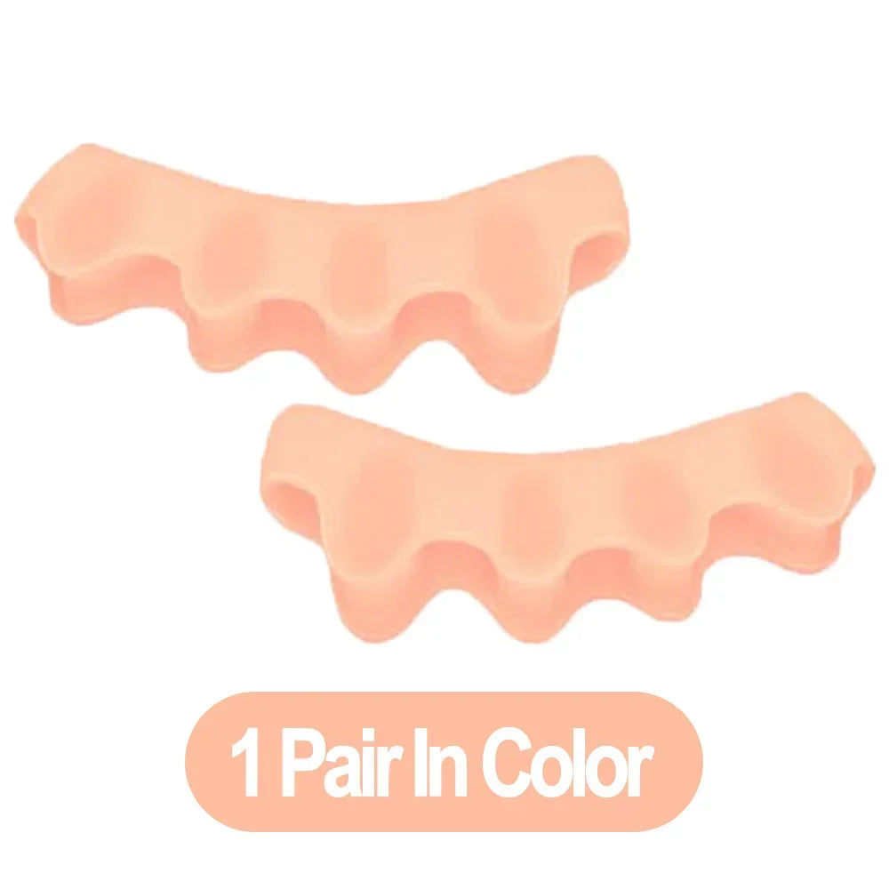 A pair of pink silicone toe separator and foot straightener shown from above.