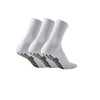 Une paire de chaussettes de football antidérapantes en silicone blanches, vue de côté.