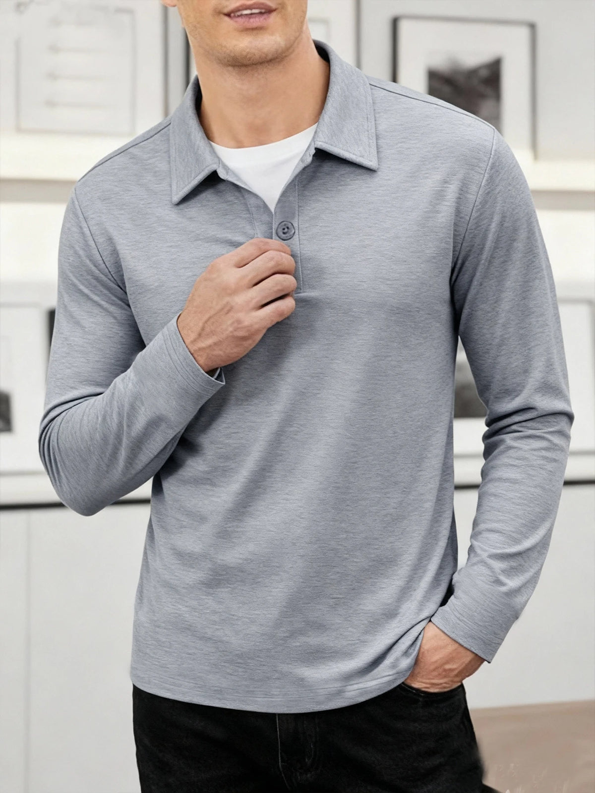 A man wearing a light gray breathable casual polo shirt with a collar and button placket.