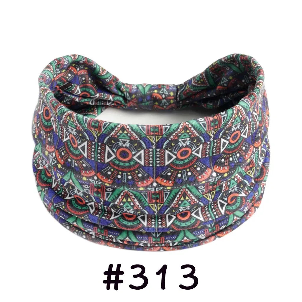 Boho knotted cotton headband featuring intricate geometric patterns in purple, green, and orange.