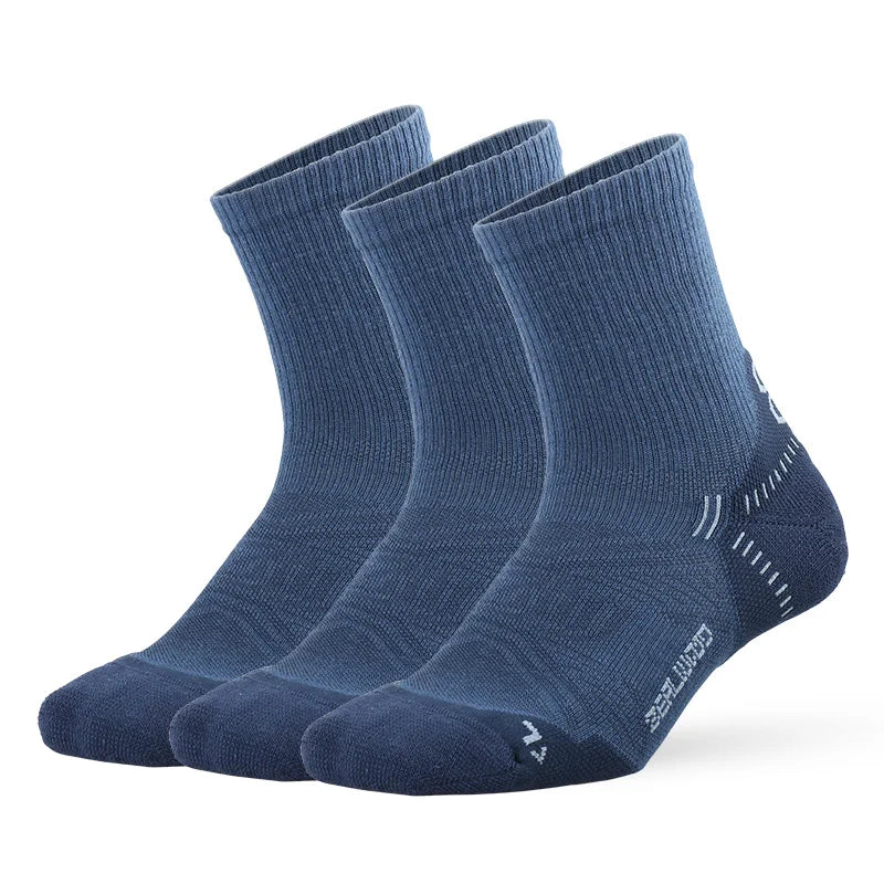 A set of dark blue breathable performance running socks laid out flat.