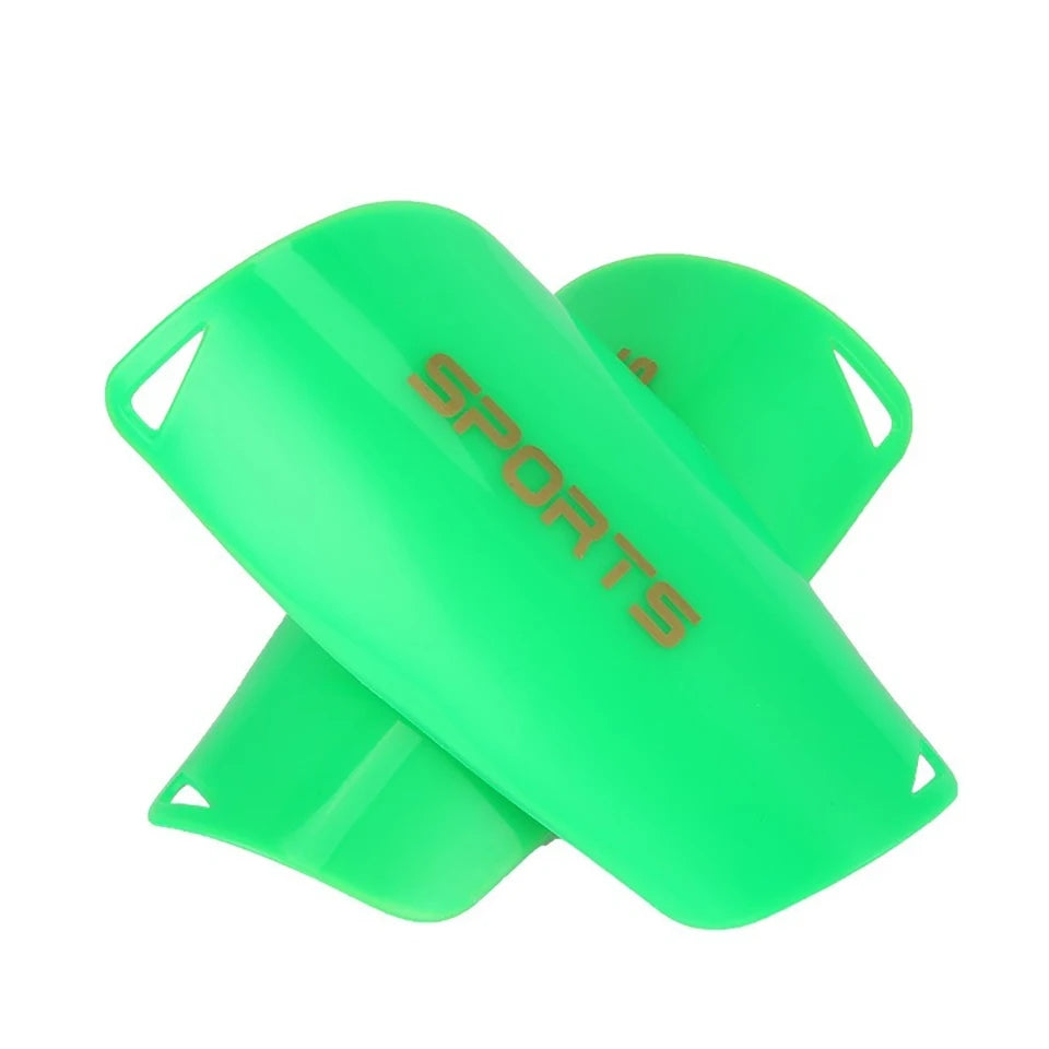 A bright green soccer shin guard is shown in a diagonal orientation.