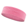 Pink moisture-wicking athletic headband rolled up and shown from the side