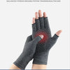 Eine Hand trägt dunkelgraue Kompressionstherapiehandschuhe, die das Produkt für die Gesundheitsversorgung demonstriert.