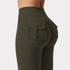 A close-up shot of a dark olive green high stretch women's yoga legging featuring a front pocket.