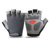 A pair of gray gym workout gloves with textured palms and an orange accent on the palm of one glove.