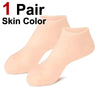 One pair of peach-colored silicone moisturizing socks for cracked feet.