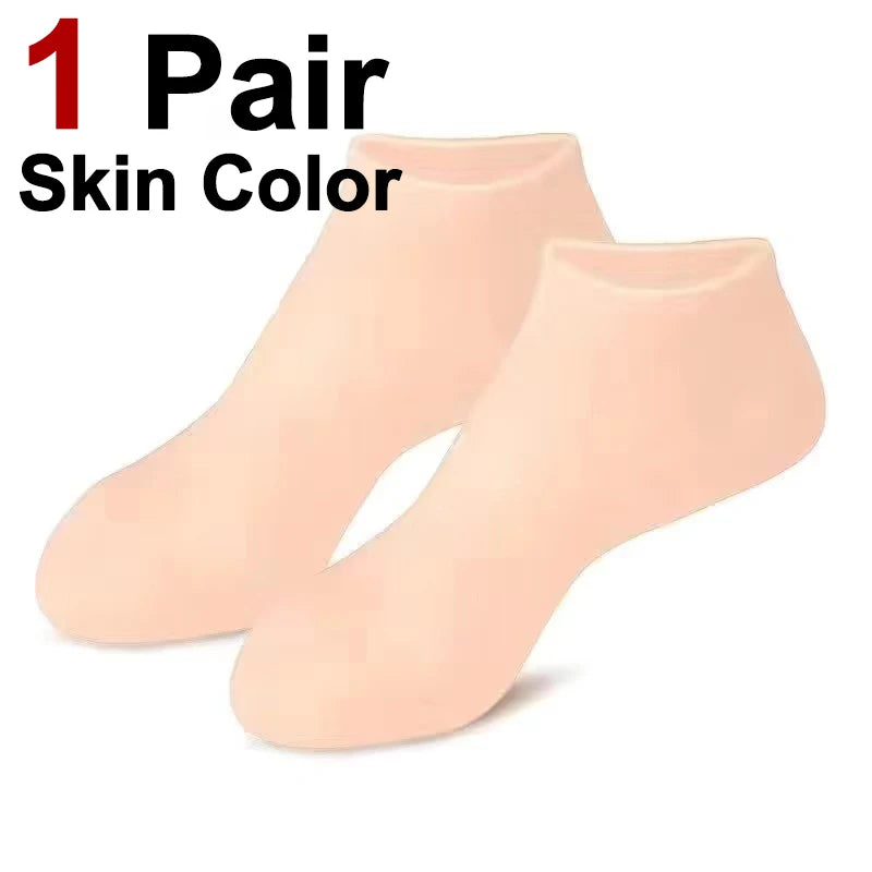 One pair of peach-colored silicone moisturizing socks for cracked feet.