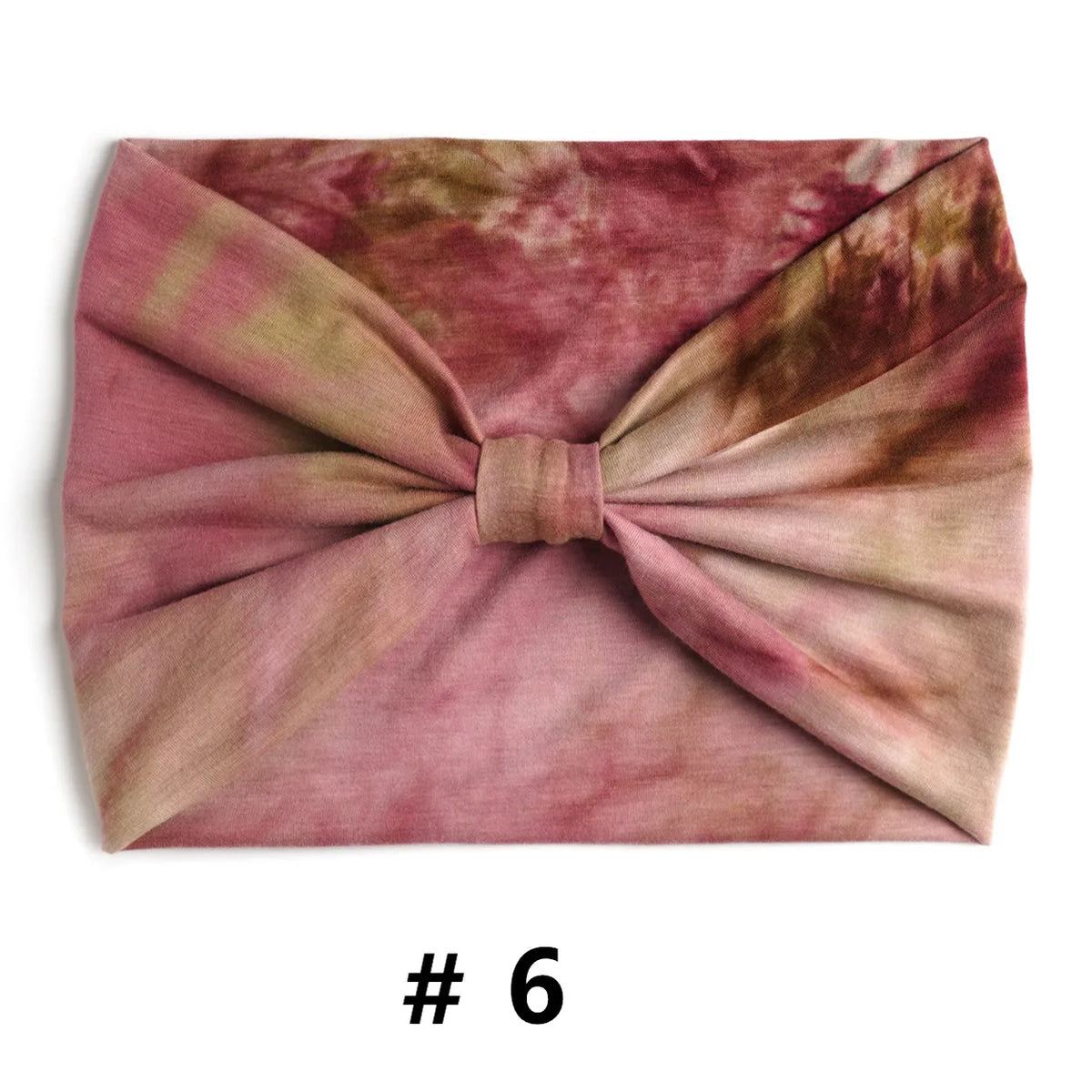 Bandeau en coton tie-dye rose et marron noué en nœud.