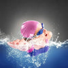 A person wearing a pink silicone swim cap is diving into blue water, creating a splash.