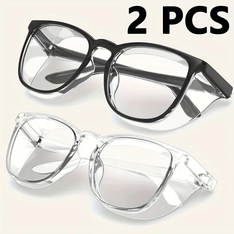 Dos pares de gafas de seguridad transparentes mostrados contra un fondo blanco.