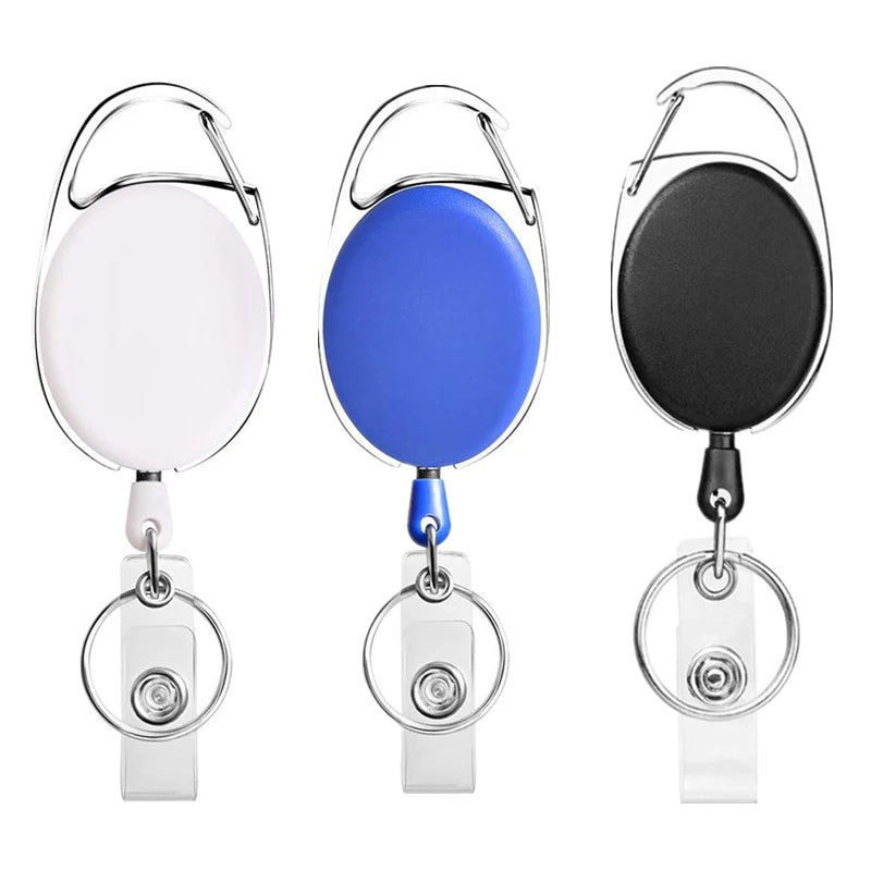 A set of three retractable ID badge reel keychains in white, blue, and black.