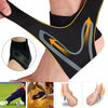 Black compression sleeve for ankle support and pain relief shown on a foot.