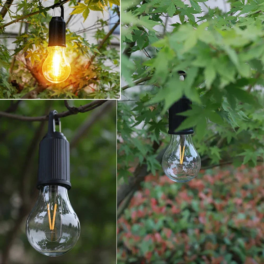 A set of three USB rechargeable LED camping lanterns illuminating foliage and outdoor scenes.