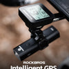 A black Rockbros intelligent GPS cycling computer mounted on a bicycle handlebar.