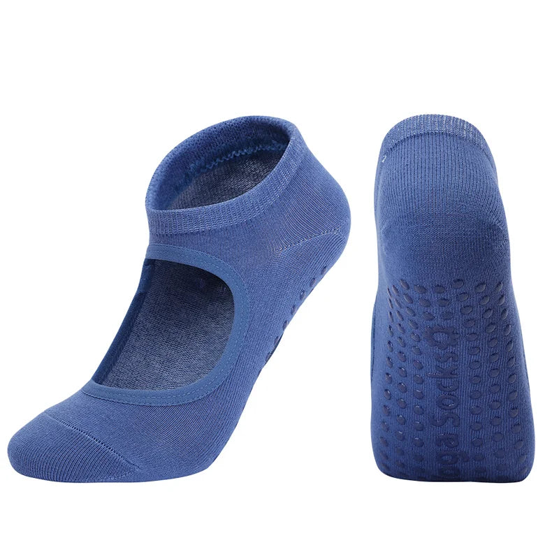 A pair of navy blue breathable women's Pilates and yoga socks shown from the side.