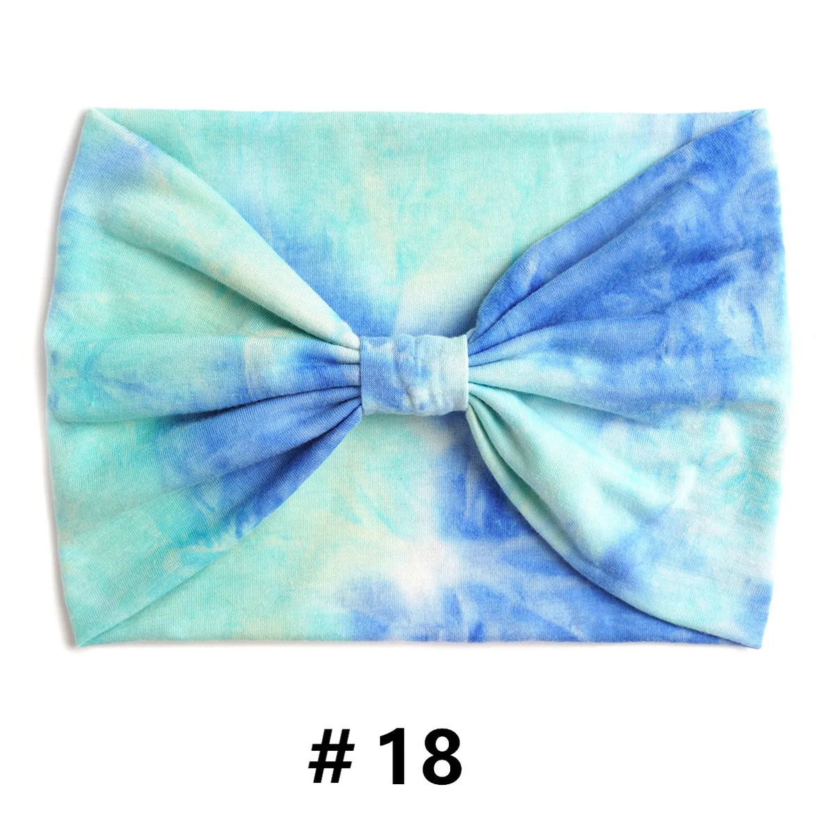 Bandeau en coton tie-dye bleu clair et blanc noué en nœud.