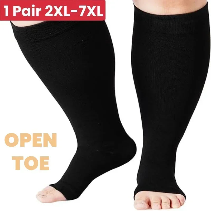 Black open toe compression socks shown on a foot and leg.