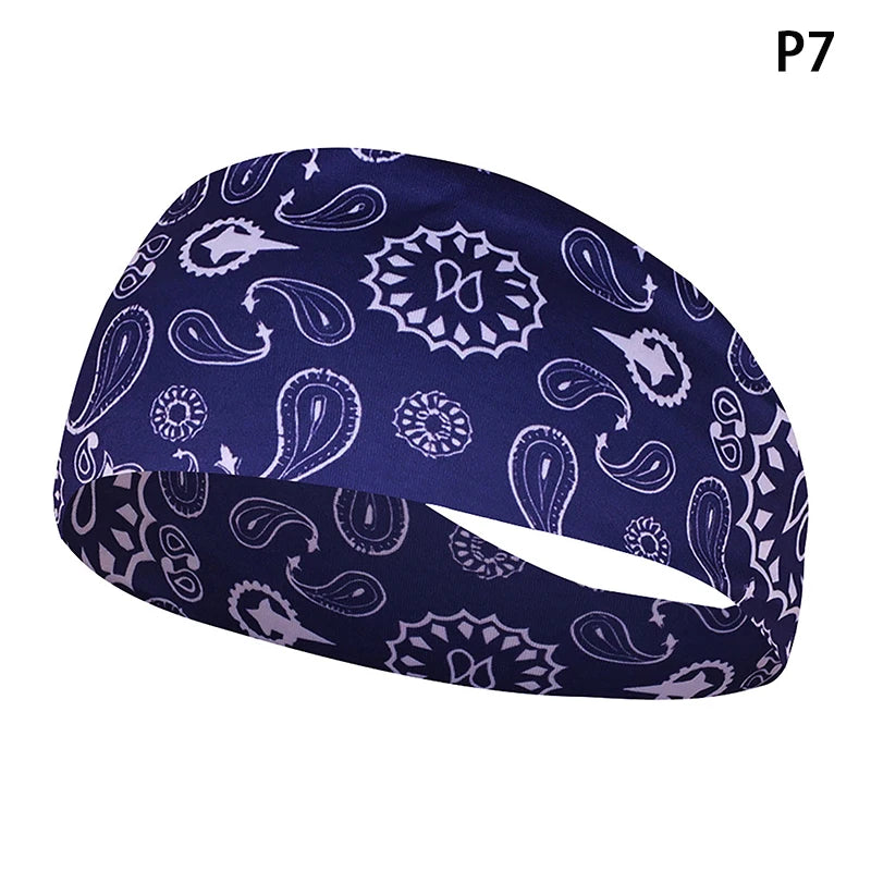 Navy blue patterned elastic sports headband shown from the side.