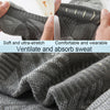 Close-up view of gray athletic mesh socks showing texture and stretch features.