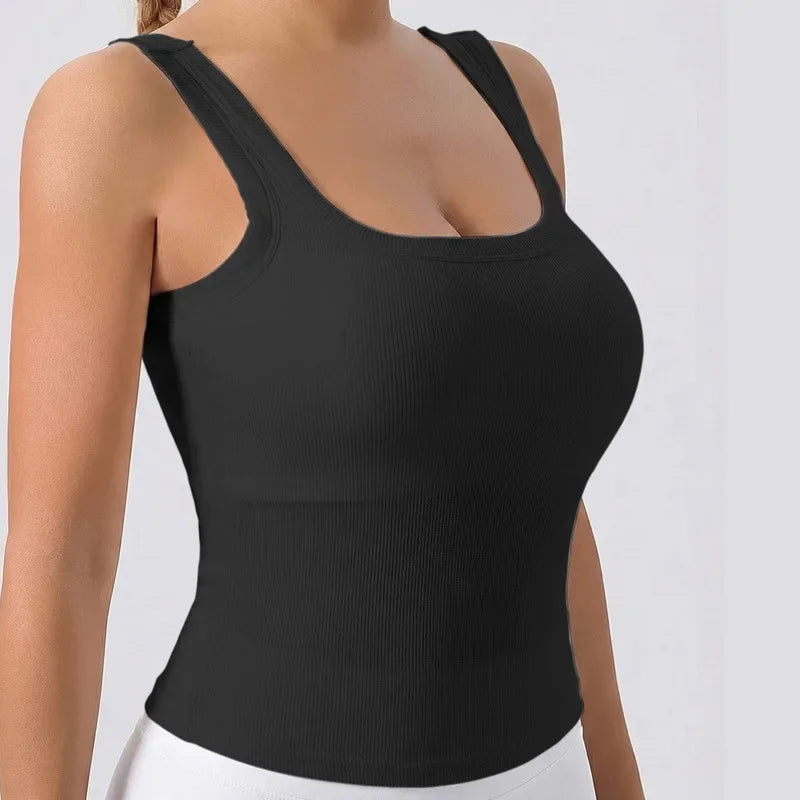 Black racerback padded tank top worn by a woman.