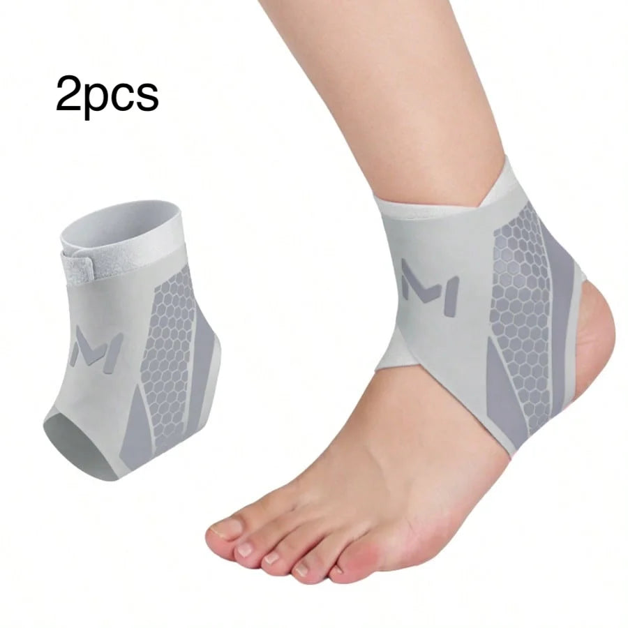 Two gray compression ankle support foot sleeves shown on a person's ankle and an isolated piece.