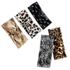 Colección de bandas para el cabello de tela elástica con estampado de leopardo en negro y marrón.