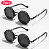A pair of black polarized round sunglasses with adjustable dimming features shown against a white background.