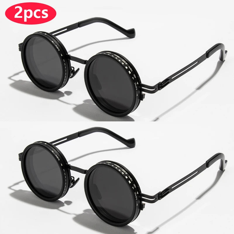 A pair of black polarized round sunglasses with adjustable dimming features shown against a white background.
