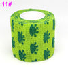 Roll of bright green elastic bandage tape with a dark green fruit pattern