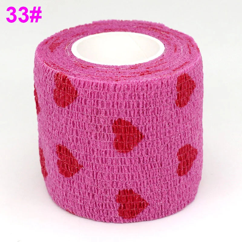 Pink elastic bandage tape rolled on, featuring a repeating red heart pattern.