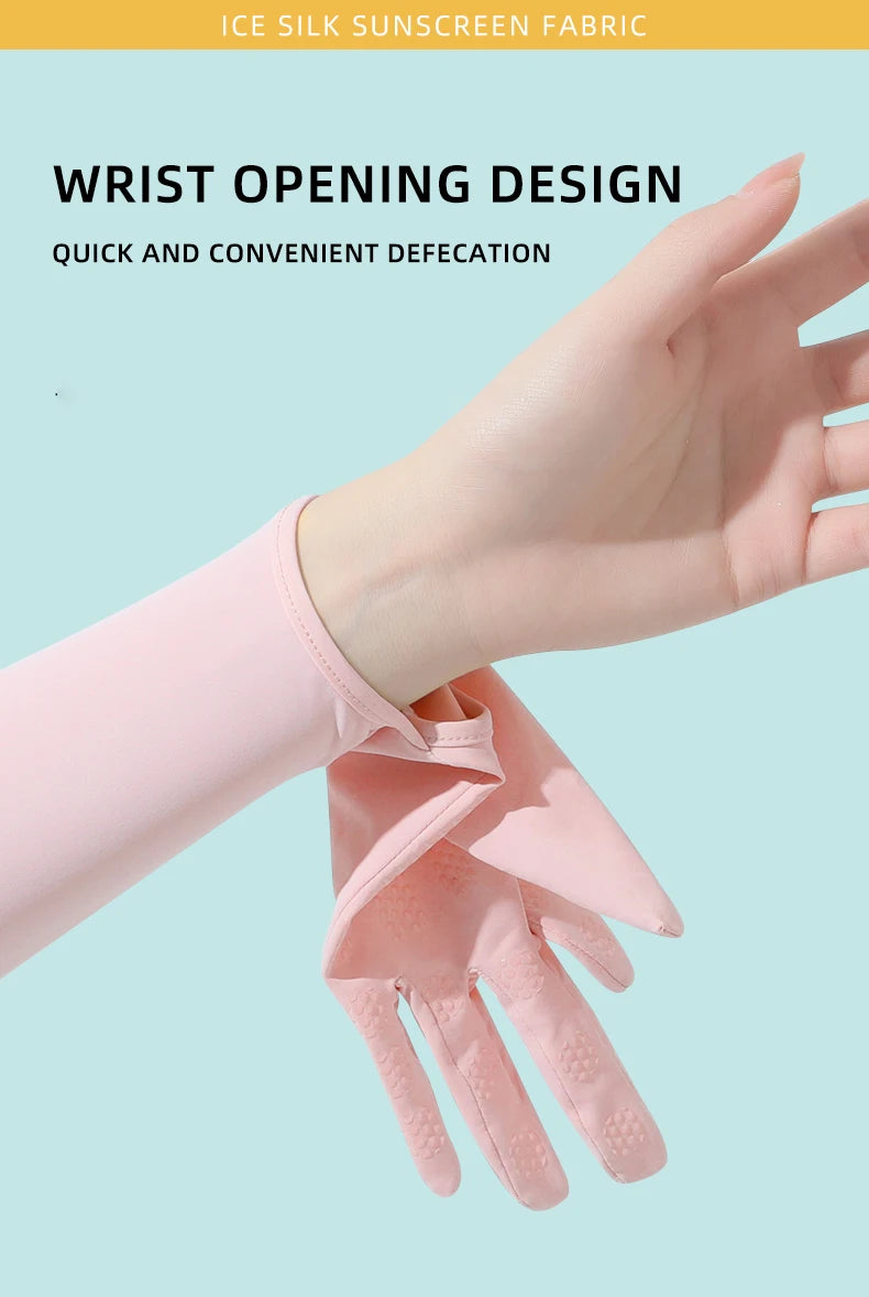 A hand wearing pink ice silk sunscreen fabric wrist opening design arm sleeves for sun protection.