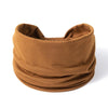 A brown boho wide headband hair wrap for women rolled into a thick, cylindrical shape.