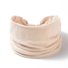 A beige boho wide headband hair wrap for women shown against a white background.