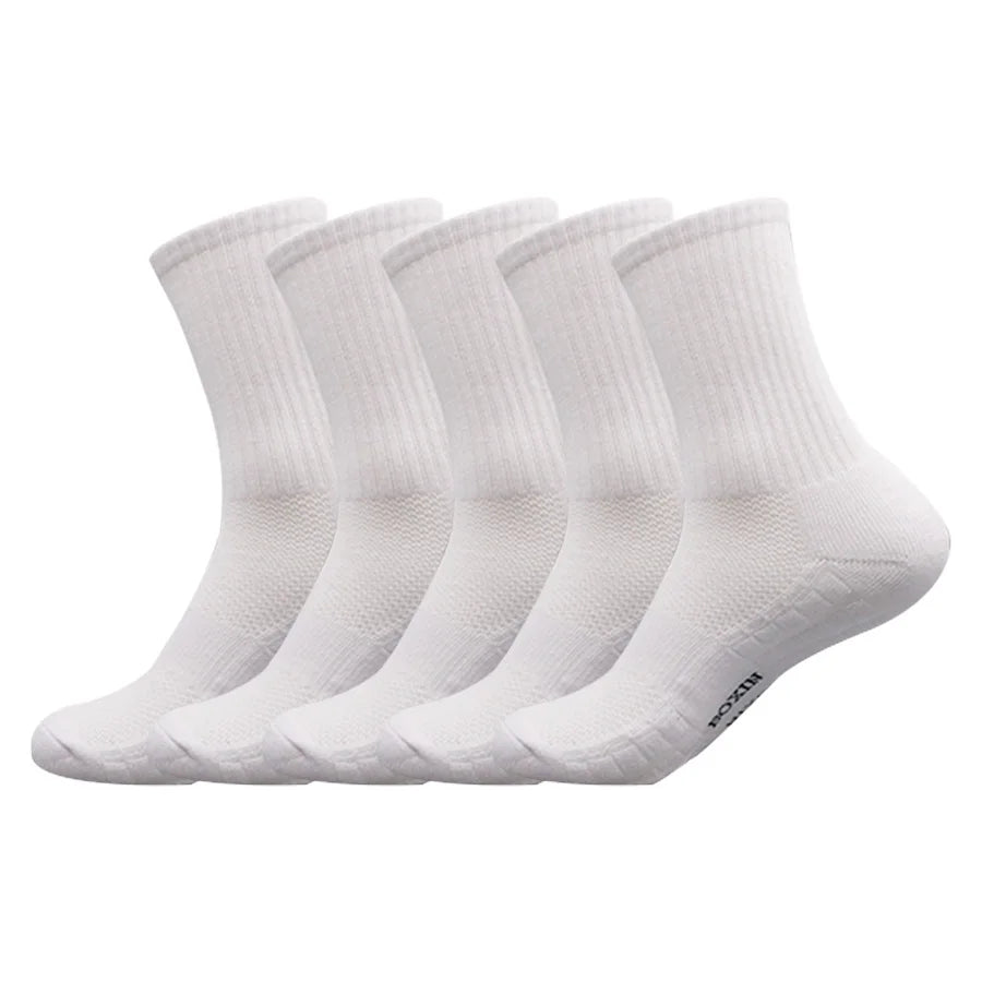 A set of white men's essential warm socks for outdoor activities, displayed in a row.