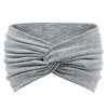 Gray knitted yoga headband with a twisted knot design