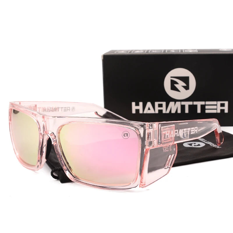 Clear pink polarized sports sunglasses with a black box in the background