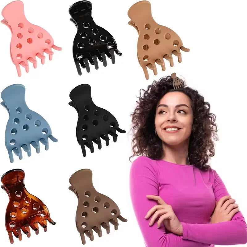 A set of various hair styling tools including pink, black, and tan root lifting hairpin curling clamps.