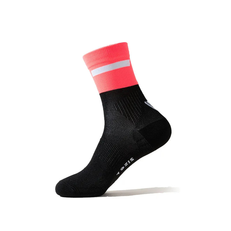 A black performance athletic running sock with a red cuff and white stripe, shown from the side.