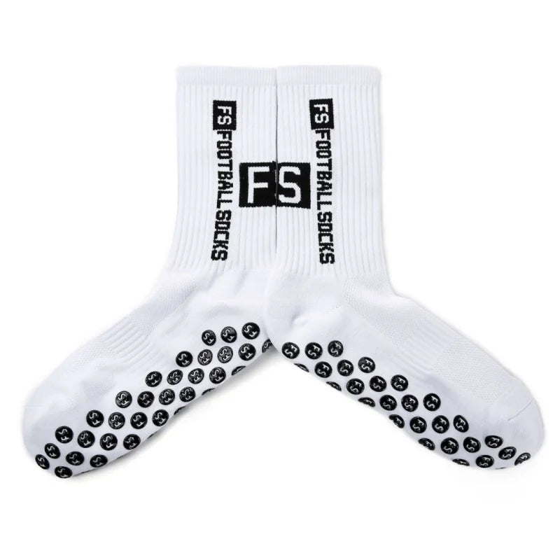 White men's athletic soccer socks with black non-slip grip pattern
