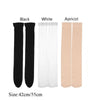 Three pairs of thigh high elastic socks in black, white, and apricot colors shown side by side.