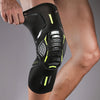 A black performance knee compression sleeve worn on a person's leg.