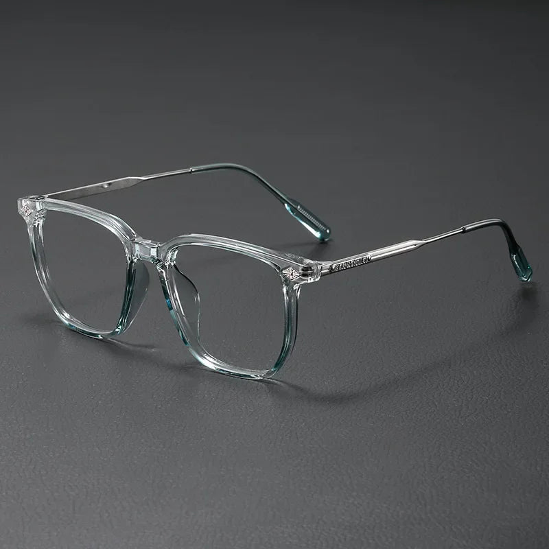 Clear acetate eyeglasses with thin metal frames shown against a dark gray background.