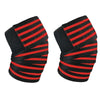 Pair of black and red knee wraps for strength training
