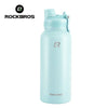 A light blue insulated stainless steel thermal water bottle with a clear cap and black logo.
